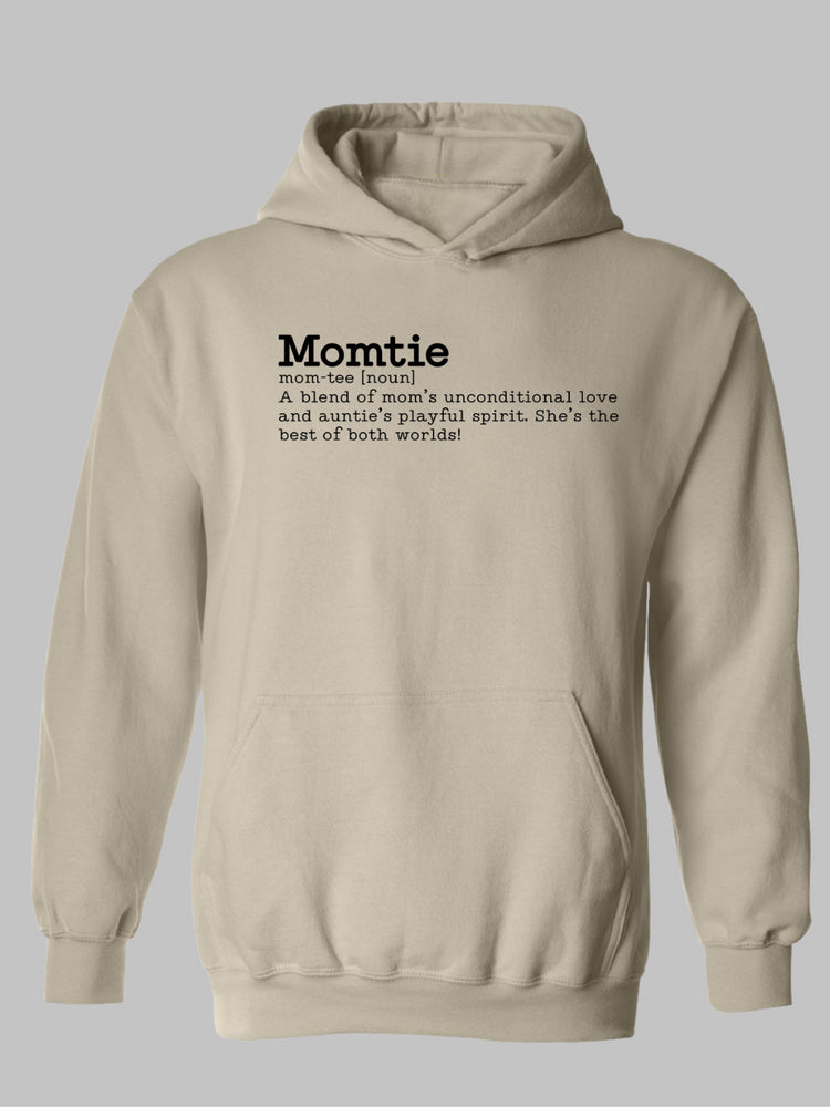 Beige hoodie featuring the word 'Momtie' in bold black text. Below it is a whimsical definition: 'mom-tee [noun] A blend of mom’s unconditional love and auntie’s playful spirit. She’s the best of both worlds! Momtie tshirt, Momtie sweatshirt, momtie hoodie, momtee hoodie, momtee sweatshirt, momtee tshirt 