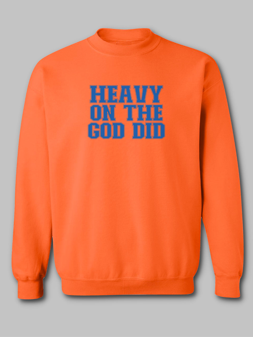 Image of a christian based vibrant orange crewneck sweatshirt with the phrase 'Heavy on the God Did' prominently displayed in bold, contrasting lettering. The text color, royal blue, stands out against the bright orange background, emphasizing the message of strong faith and divine intervention. The design reflects a bold statement of spiritual confidence and gratitude. Faith based. 