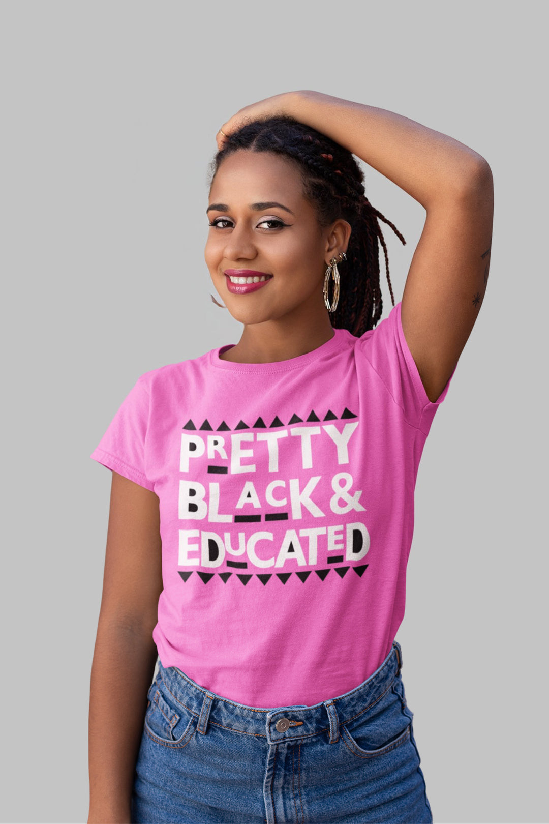  t-shirt in HOT PINK, featuring the phrase 'Pretty, Black, and Educated' in bold BLACK AND WHITE  lettering across the front. The font is Bold letters, emphasizing a message of empowerment and pride.